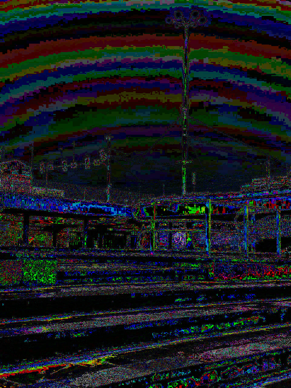 dark and colorful glitched photo of an underground pedestrian crossing